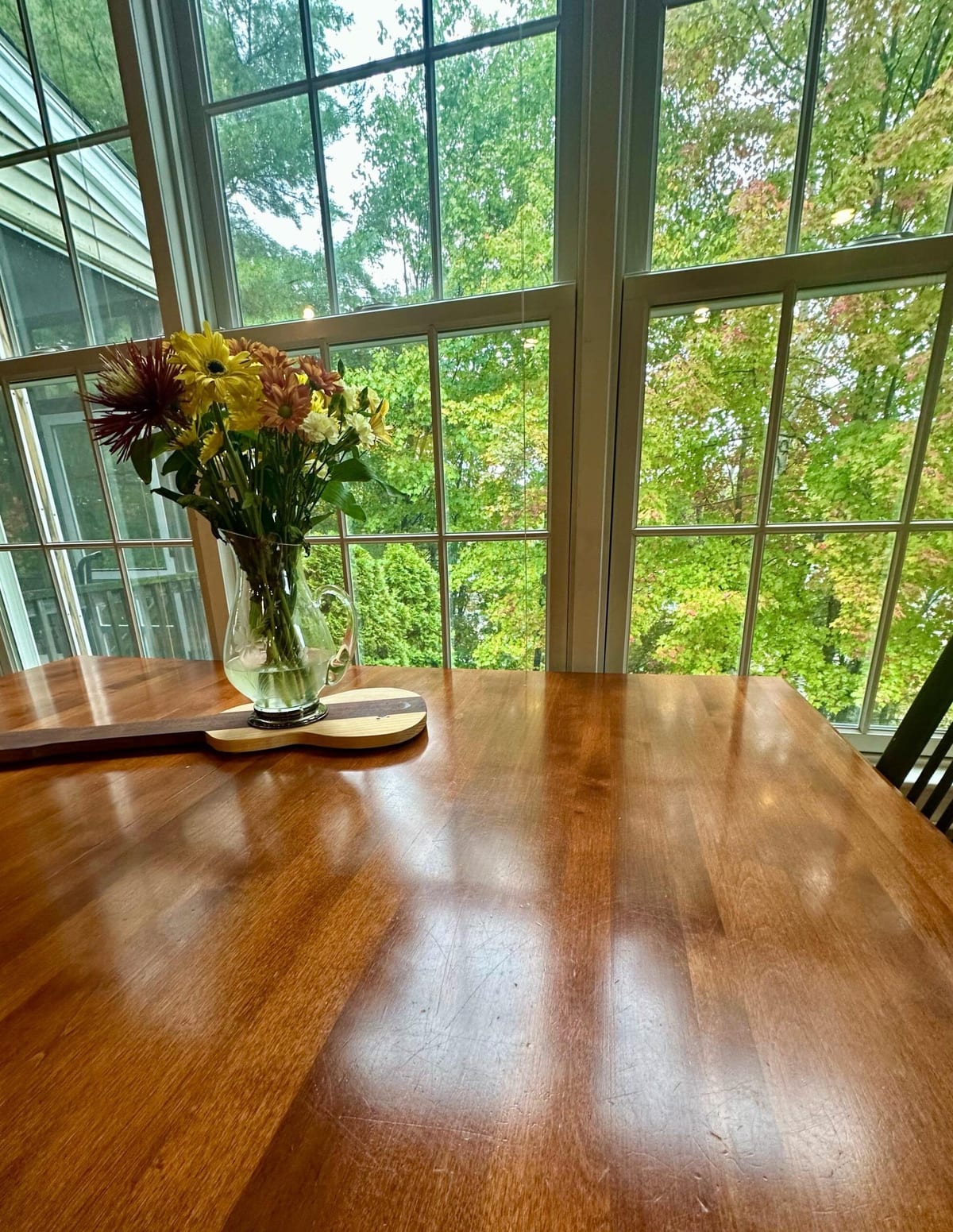 A dining table and chairs cleaned and set straight