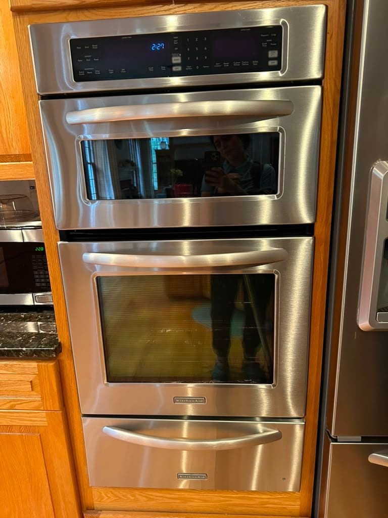 A stainless steel double wall oven cleaned inside and out